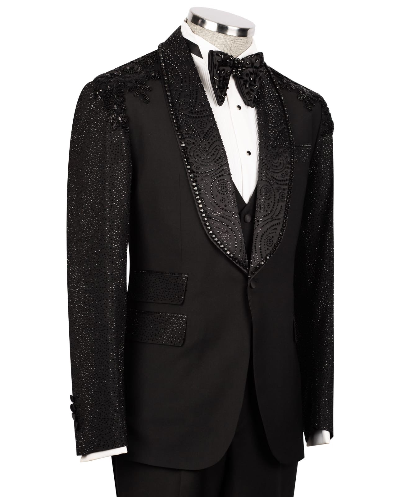 Black tuxedo with decorative lapels on a mannequin against a white background