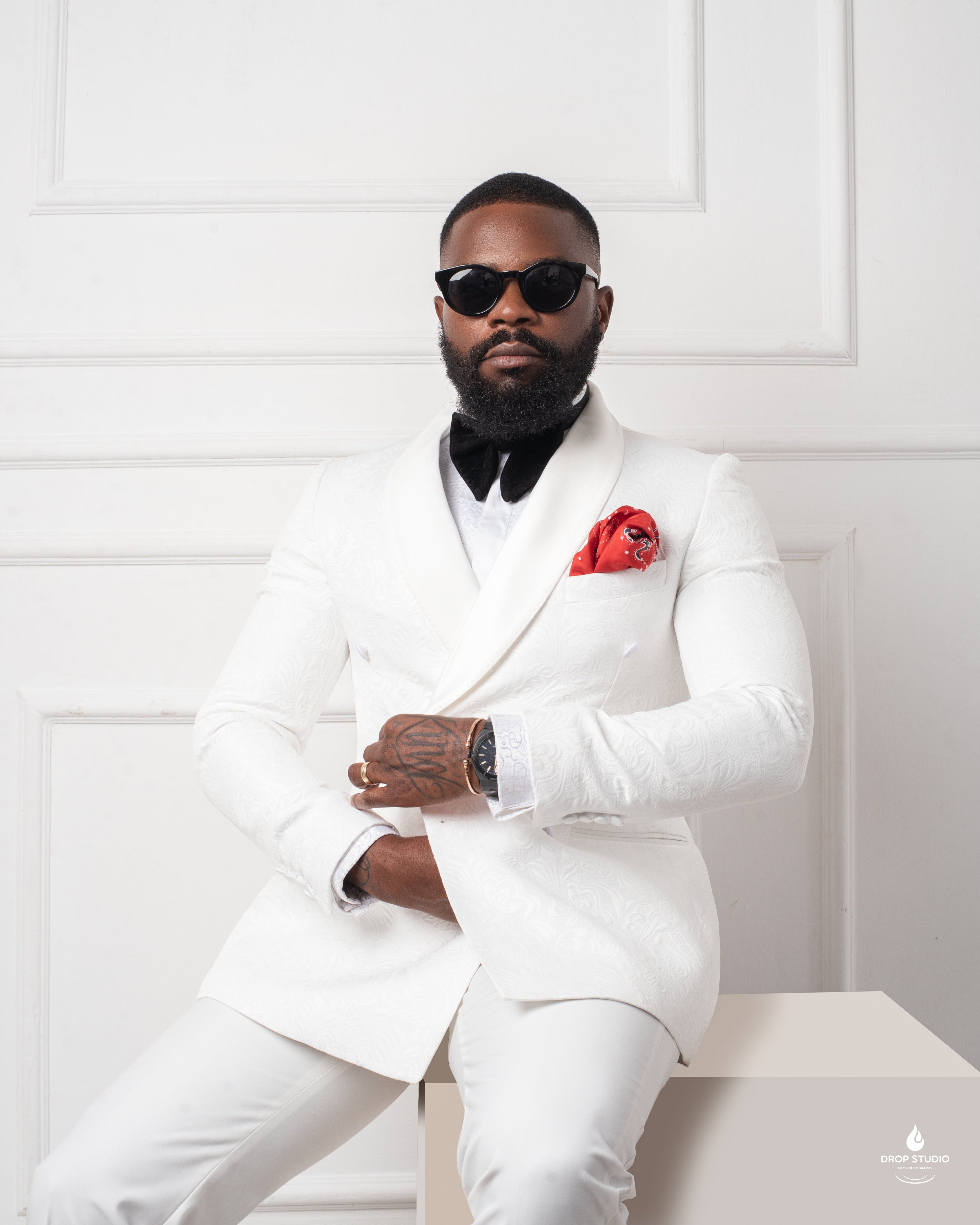 man in Ivory monarch paisley tuxedo
