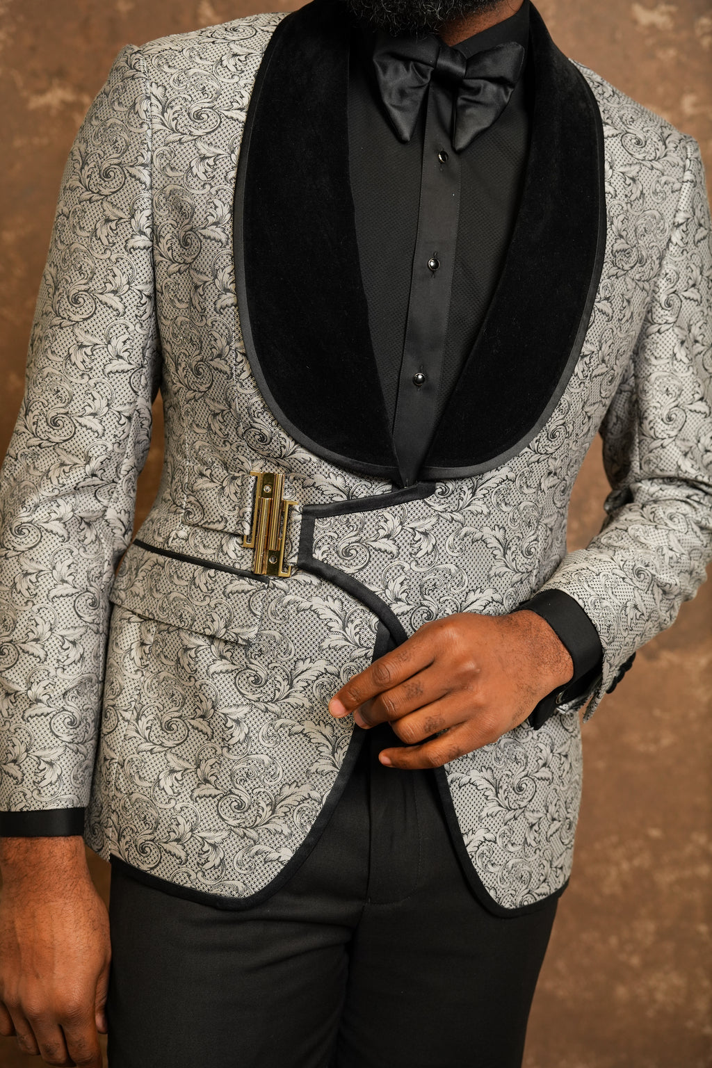 Patterned gray tuxedo with a black tuxedo shirt 