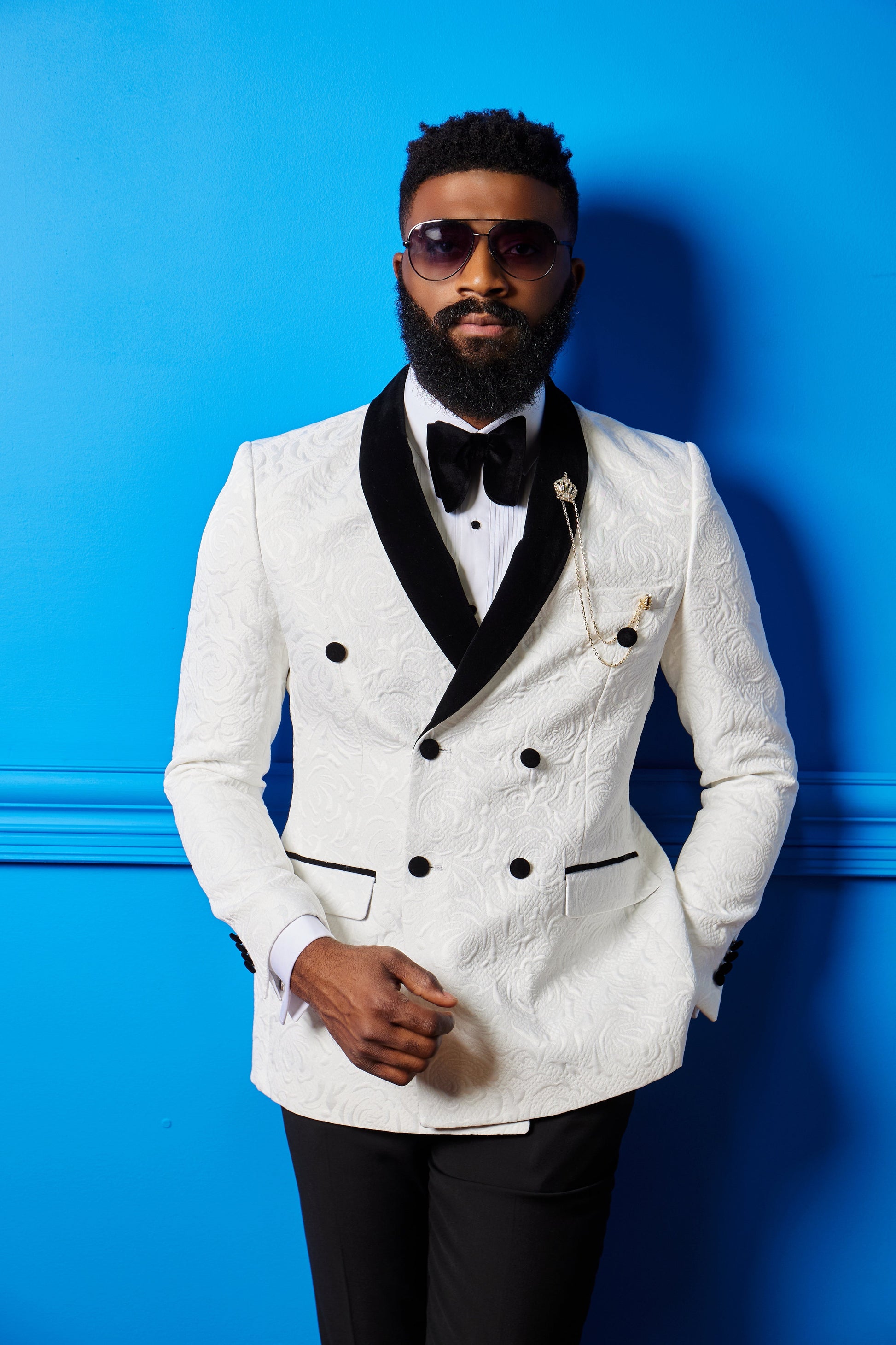 a men in floral paisley tuxedo