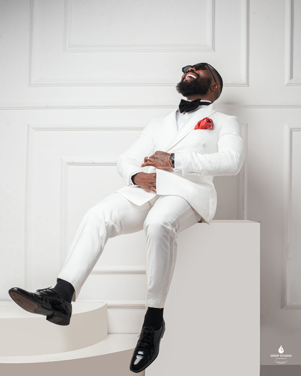 man in Ivory monarch paisley tuxedo